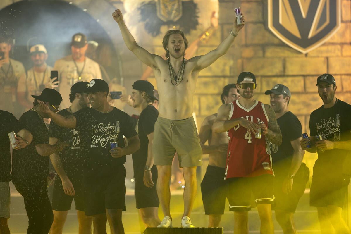 Golden Knights center William Karlsson cheers toward the crowd as the Knights take the stage to ...