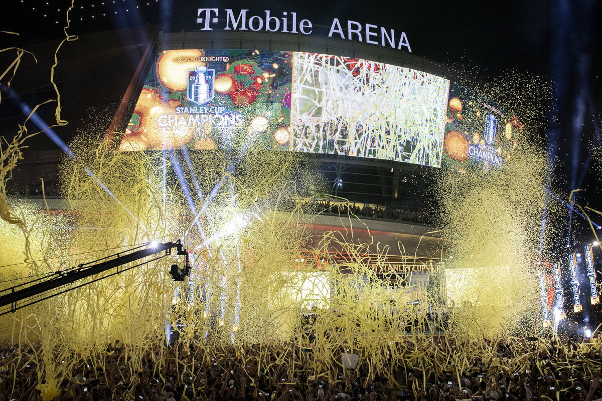 Confetti showers the crowd during the Golden Knights celebration for their Stanley Cup Final wi ...
