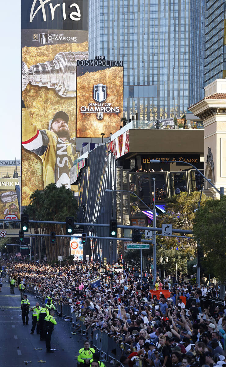 Fans cheer during the Golden Knights’ NHL hockey Stanley Cup victory parade, Saturday, J ...