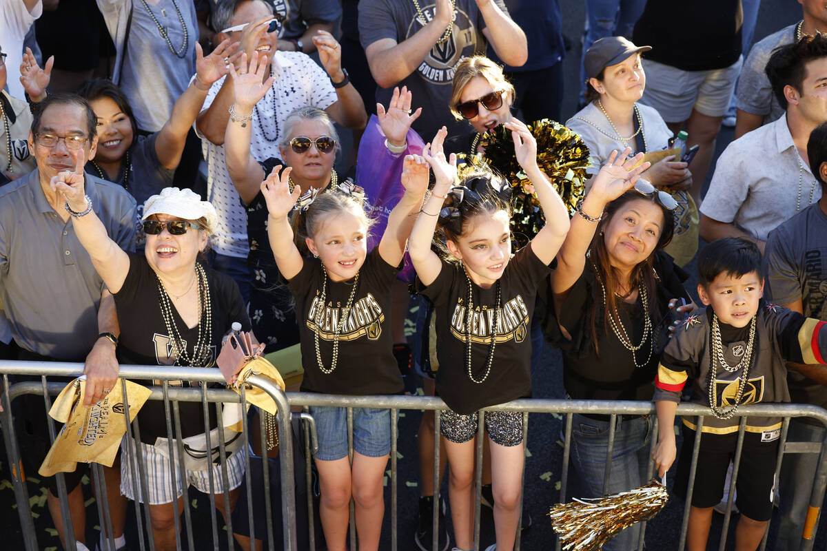 Fans cheer during the Golden Knights’ NHL hockey Stanley Cup victory parade, Saturday, J ...