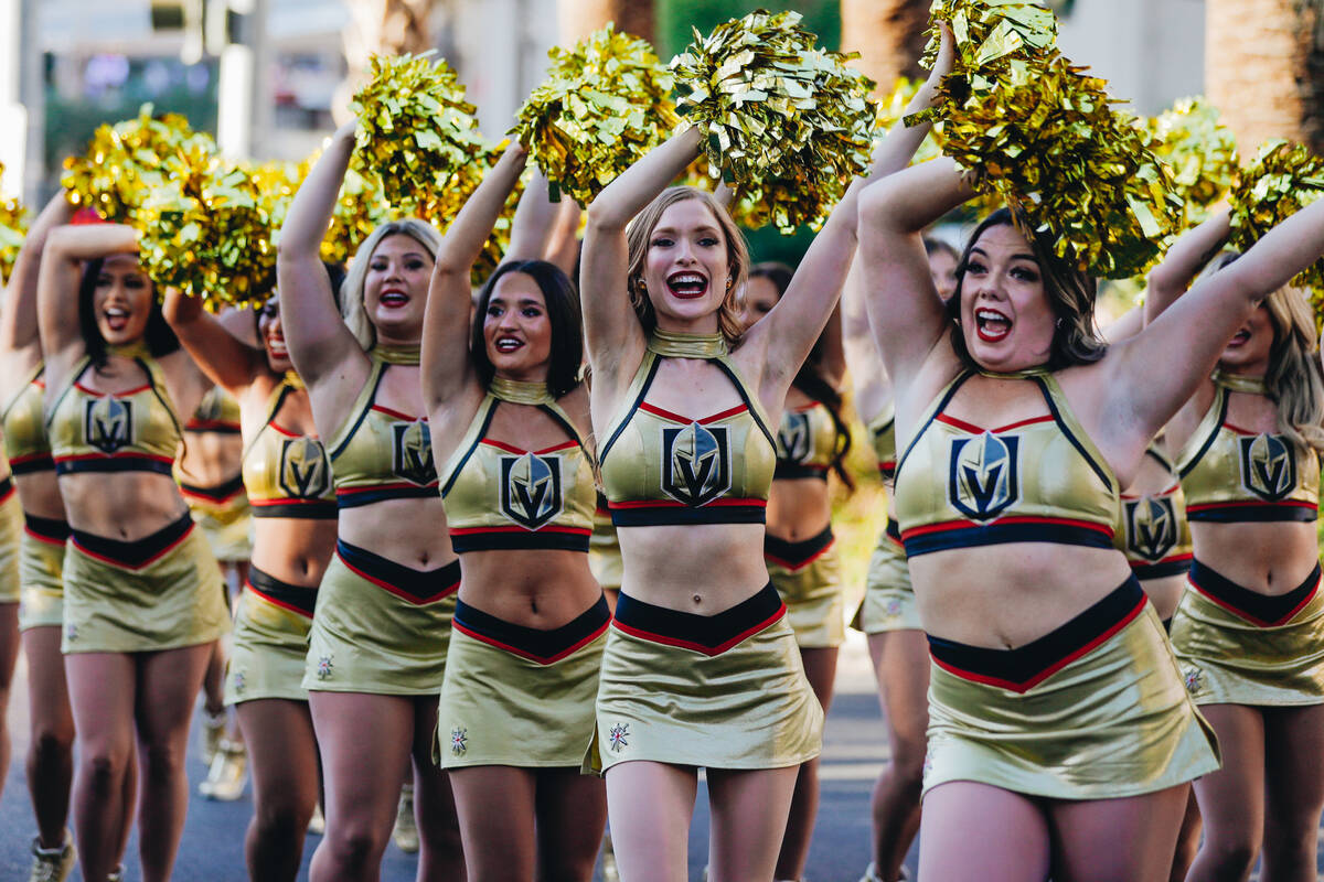 Viva Vegas cheerleaders pump up the crowd during the Stanley Cup championship parade on Saturda ...