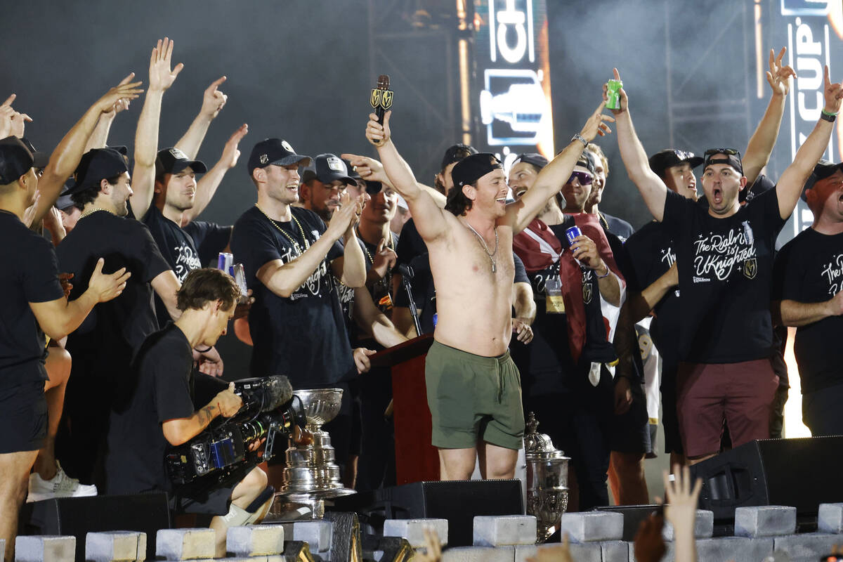 Vegas Golden Knights right wing Jonathan Marchessault, center, celebrates during a rally at Tos ...