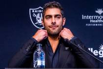 Jimmy Garoppolo considers a response during a press conference at the Raiders Headquarters and ...