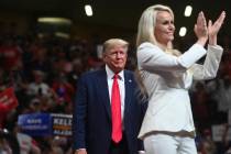 FILE - U.S. Senate candidate Kelly Tshibaka, right, applauds as she is joined by former Preside ...