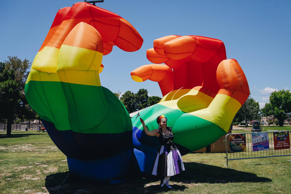 Sue Woods poses in her homemade pride dress at Henderson Pride Fest on Saturday, June 17, 2023, ...