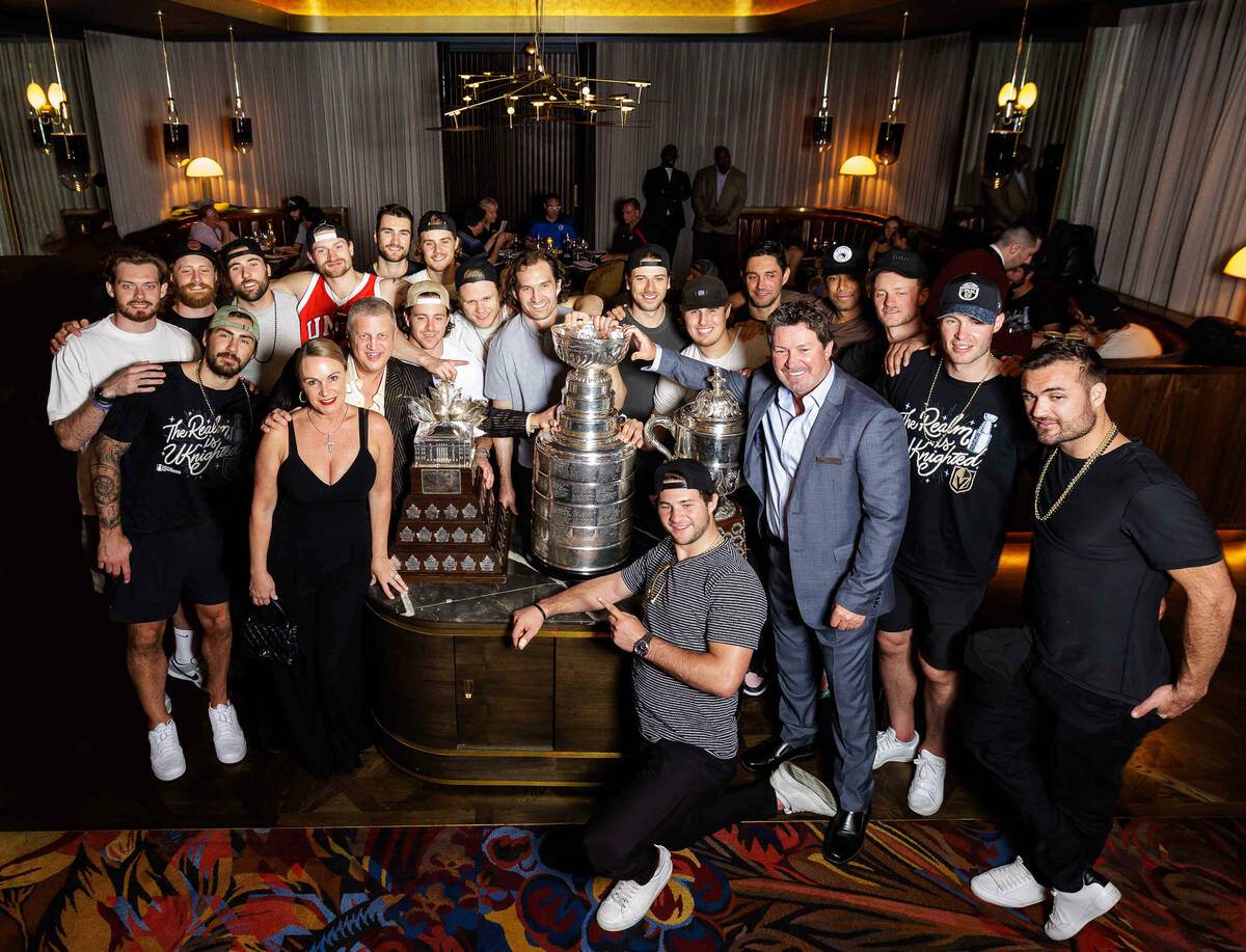 Members of the Golden Knights are shown with co-owner Derek Stevens; his wife, Nicole; and Circ ...