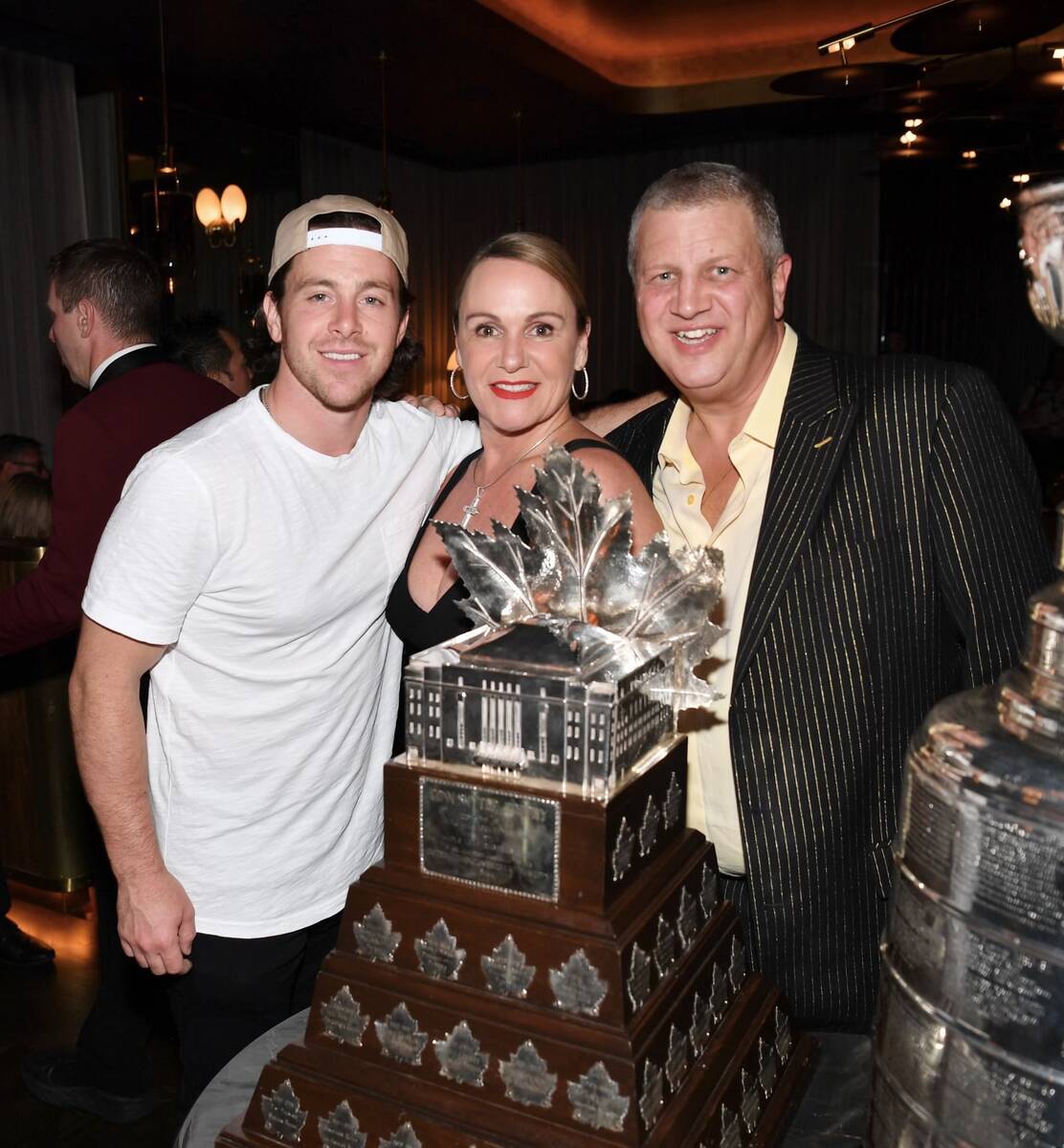 Golden-Knight Jonathan Marchessault is shown with Circa co-owner Derek Stevens and his wife, Ni ...