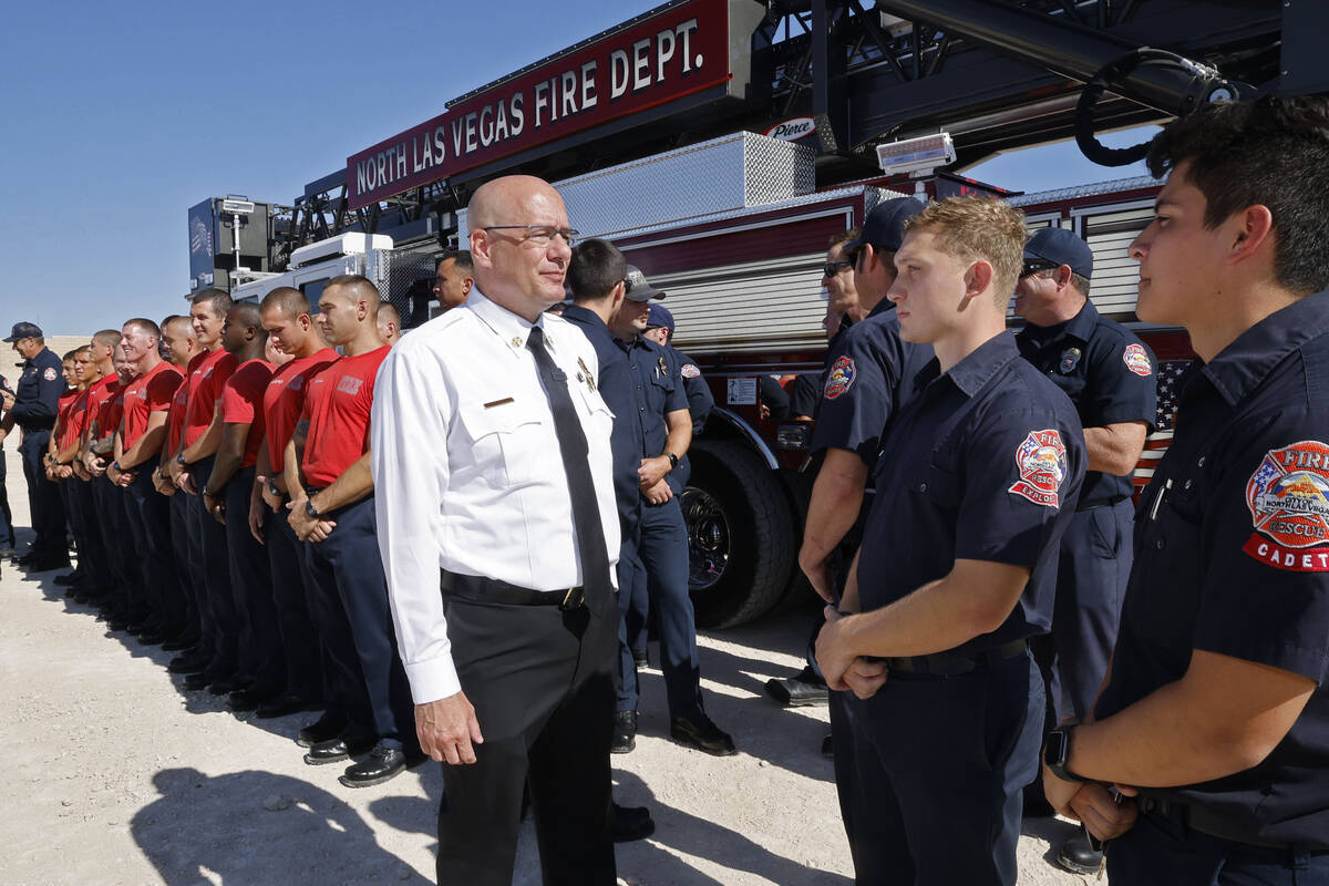 North Las Vegas Fire Chief Joseph Calhounm, left, talks with North Las Vegas Fire Department ca ...