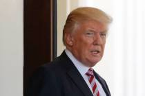 FILE - President Donald Trump watches Turkish President Recep Tayyip Erdogan depart the White H ...