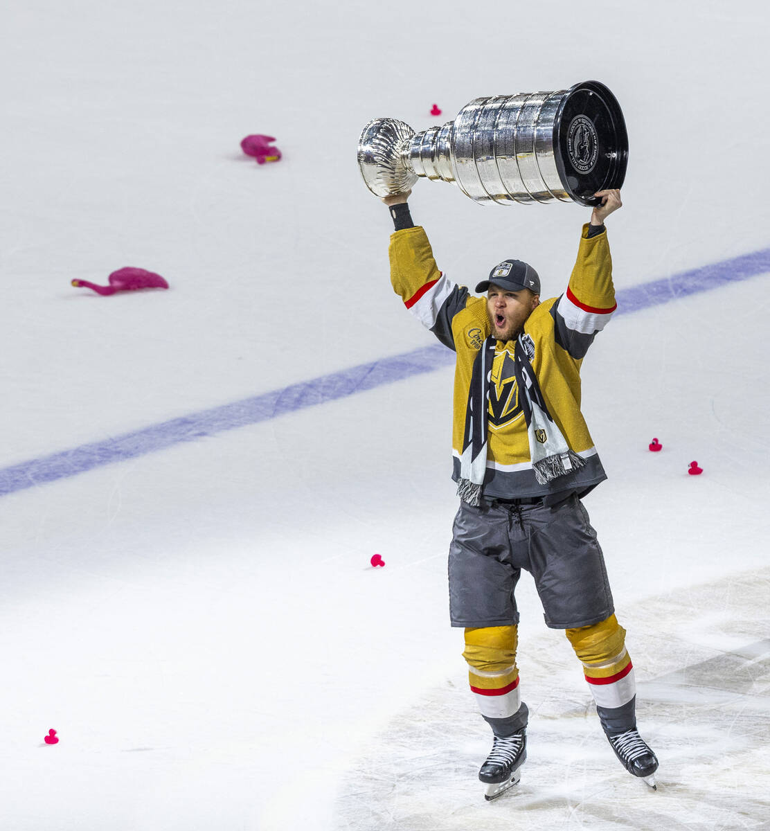 Golden Knights center William Karlsson (71) hoists the Stanley Cup after their 9-3 win over the ...