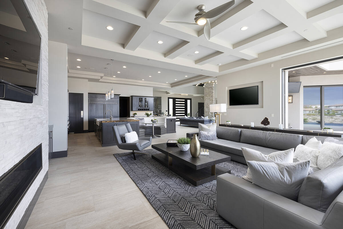 The 6,557-square-foot home includes a family room and a living room in the first level. (Dougla ...