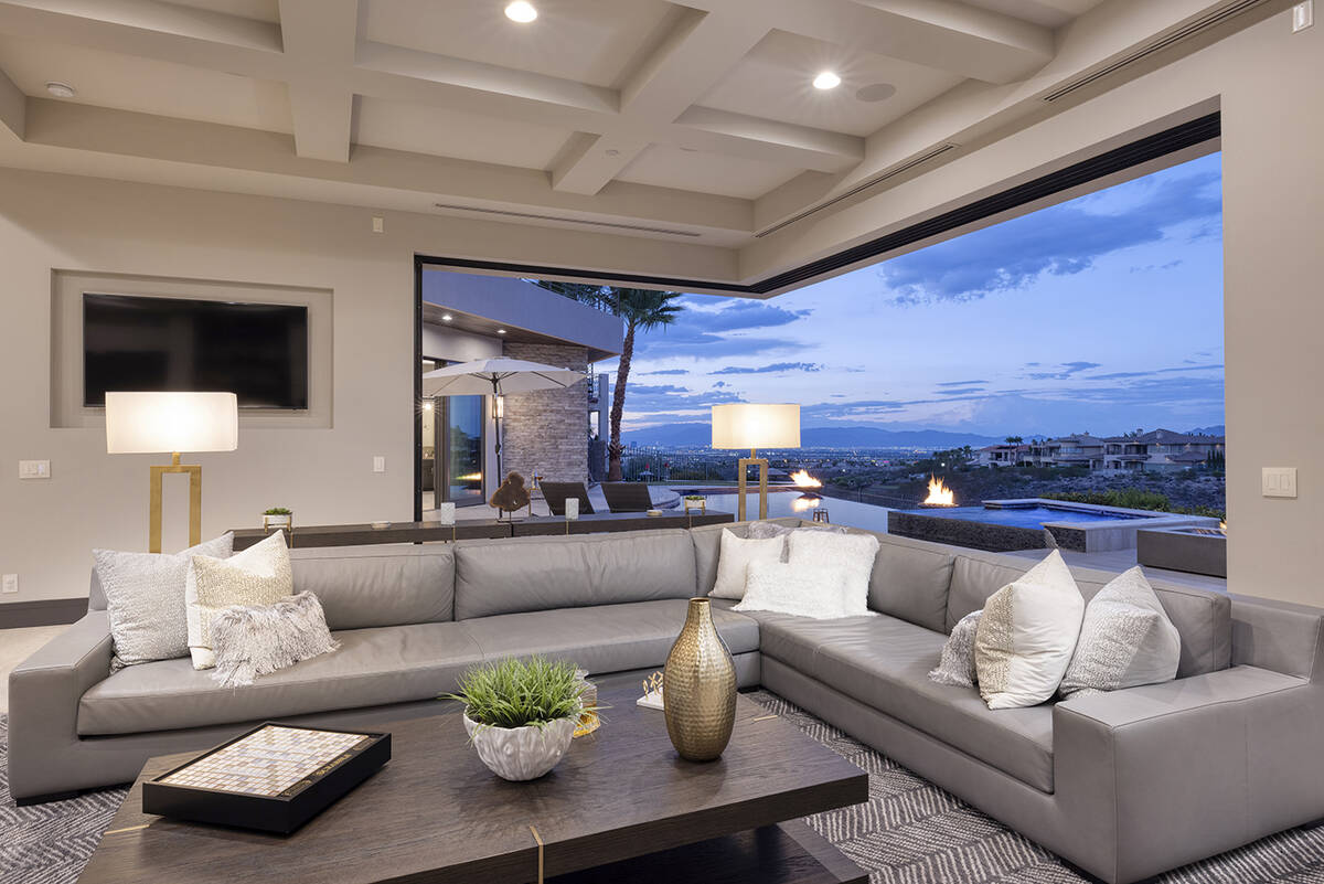 The family room has a disappearing corner that provides views of the Las Vegas Valley. (Douglas ...