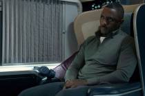 This image released by Apple TV+ shows Idris Elba in a scene from the action series "Hijack." ( ...