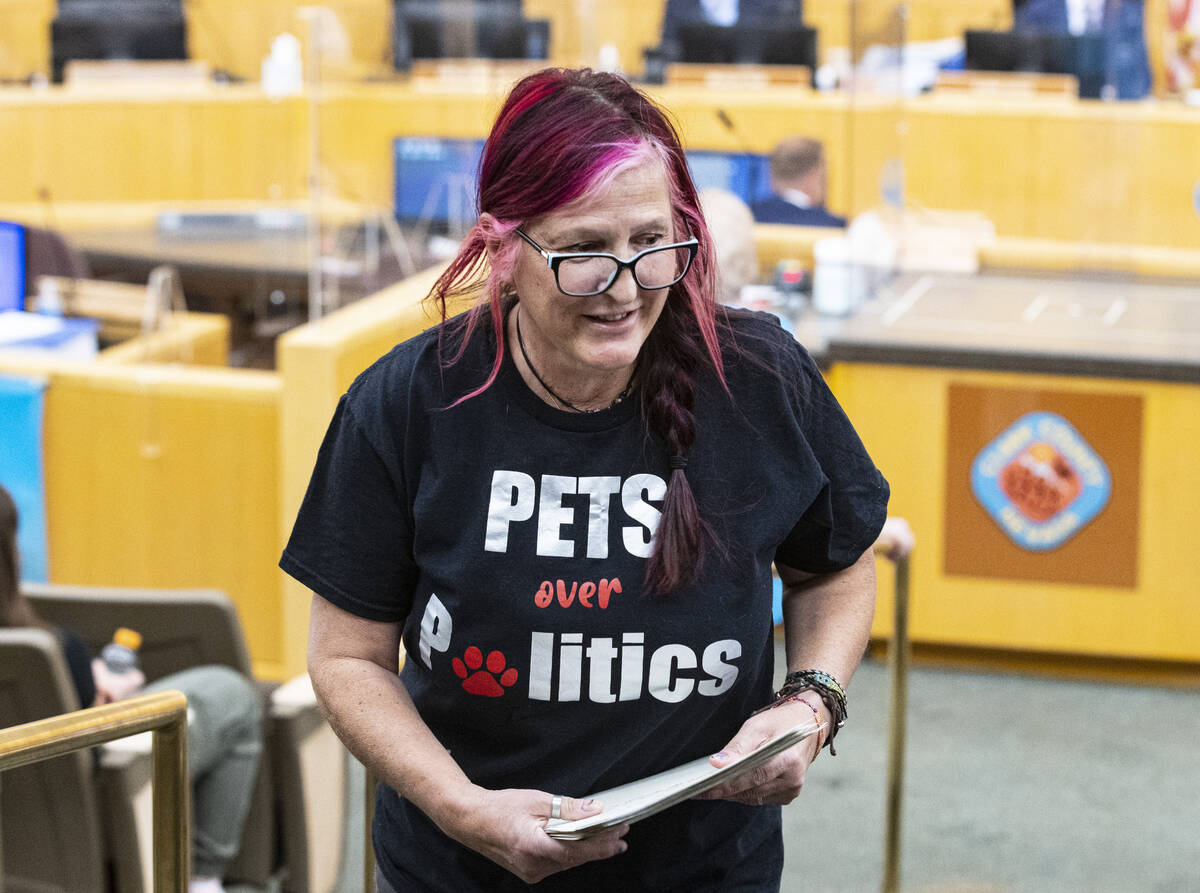 Tracy Paz, who opposes funding The Animal Foundation, wearing a T-shirt with a message saying " ...