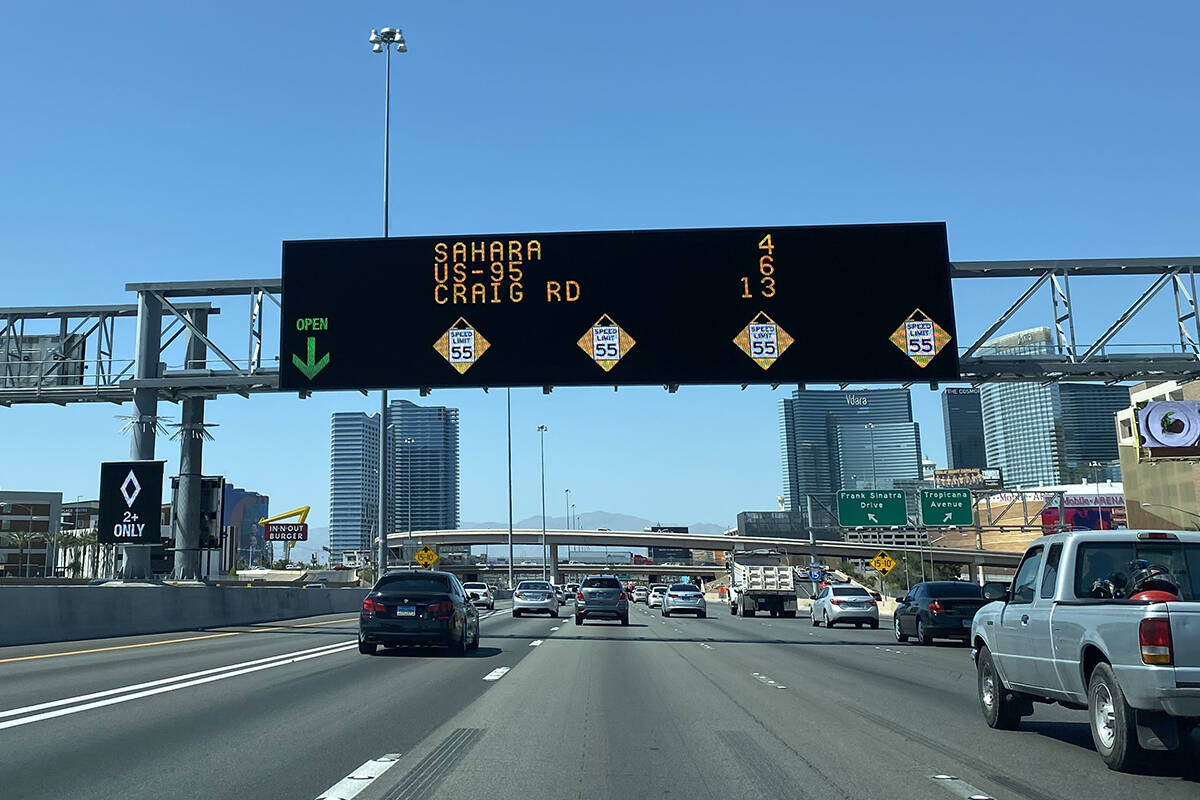 A dynamic message board sign on Interstate 15 northbound displays reduced speed limits due to a ...