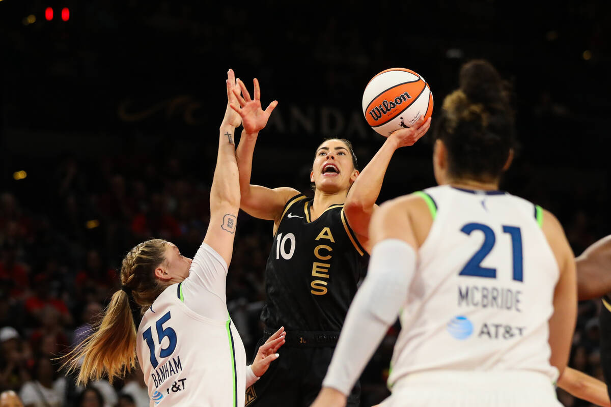 Las Vegas Aces guard Kelsey Plum (10) takes a shot during a game against the Minnesota Lynx on ...