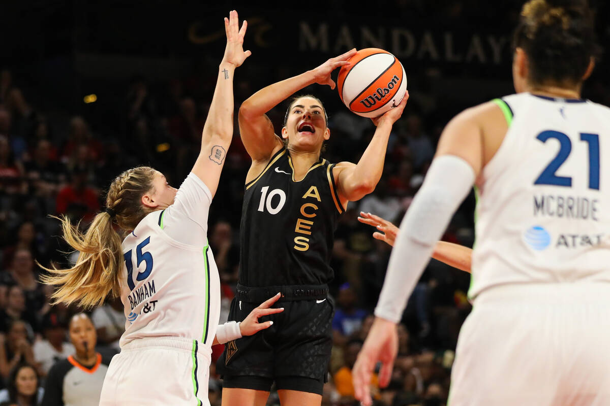 Las Vegas Aces guard Kelsey Plum (10) takes a shot during a game against the Minnesota Lynx on ...