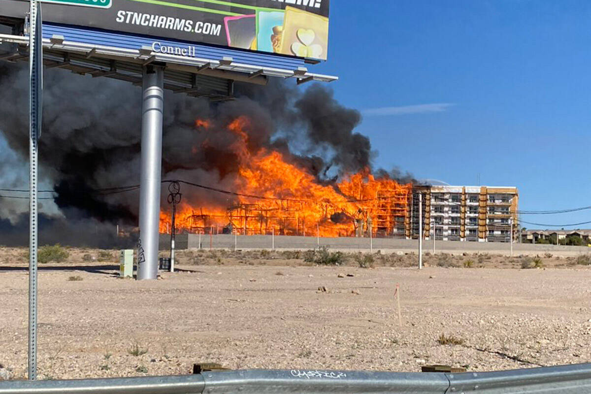 An under-construction residential complex burns near Buffalo Drive and the 215 Beltway. (Nevada ...