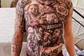 Raiders DE adds some legendary ink