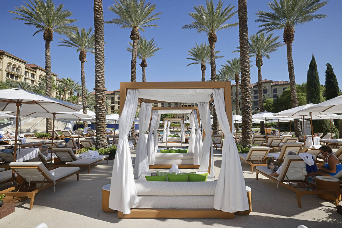 Daybeds are seen at the pool side of Green Valley Ranch Resort, Thursday, June 22, 2023, in Hen ...