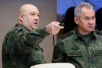 FILE - The top Russian military commander in Ukraine, Gen. Sergei Surovikin, left, and Russian ...