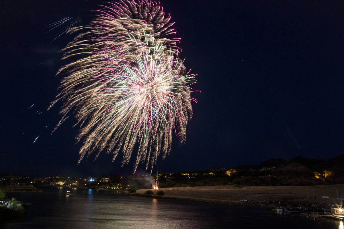 A fireworks display during Fourth of July weekend celebrations at Lake Las Vegas on Sunday, Jul ...
