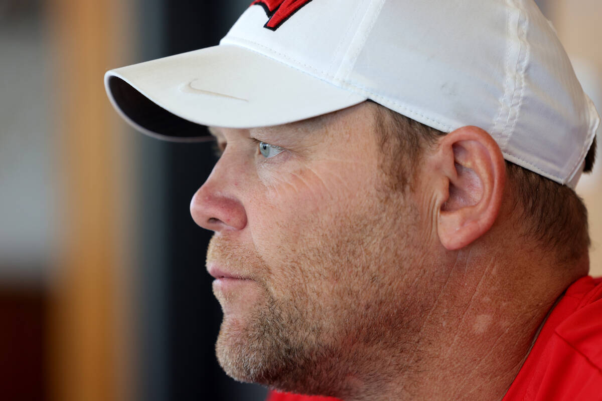 UNLV football coach Barry Odom talks to a reporter at his office in the Fertitta Football Compl ...
