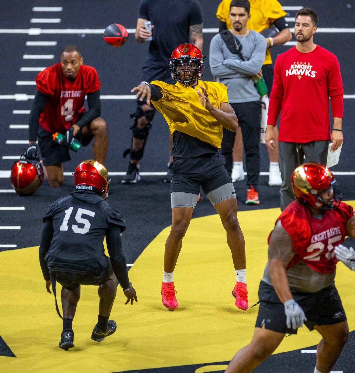 Vegas Knight Hawks quarterback Daquan Neal releases a pass during practice at The Dollar Loan C ...