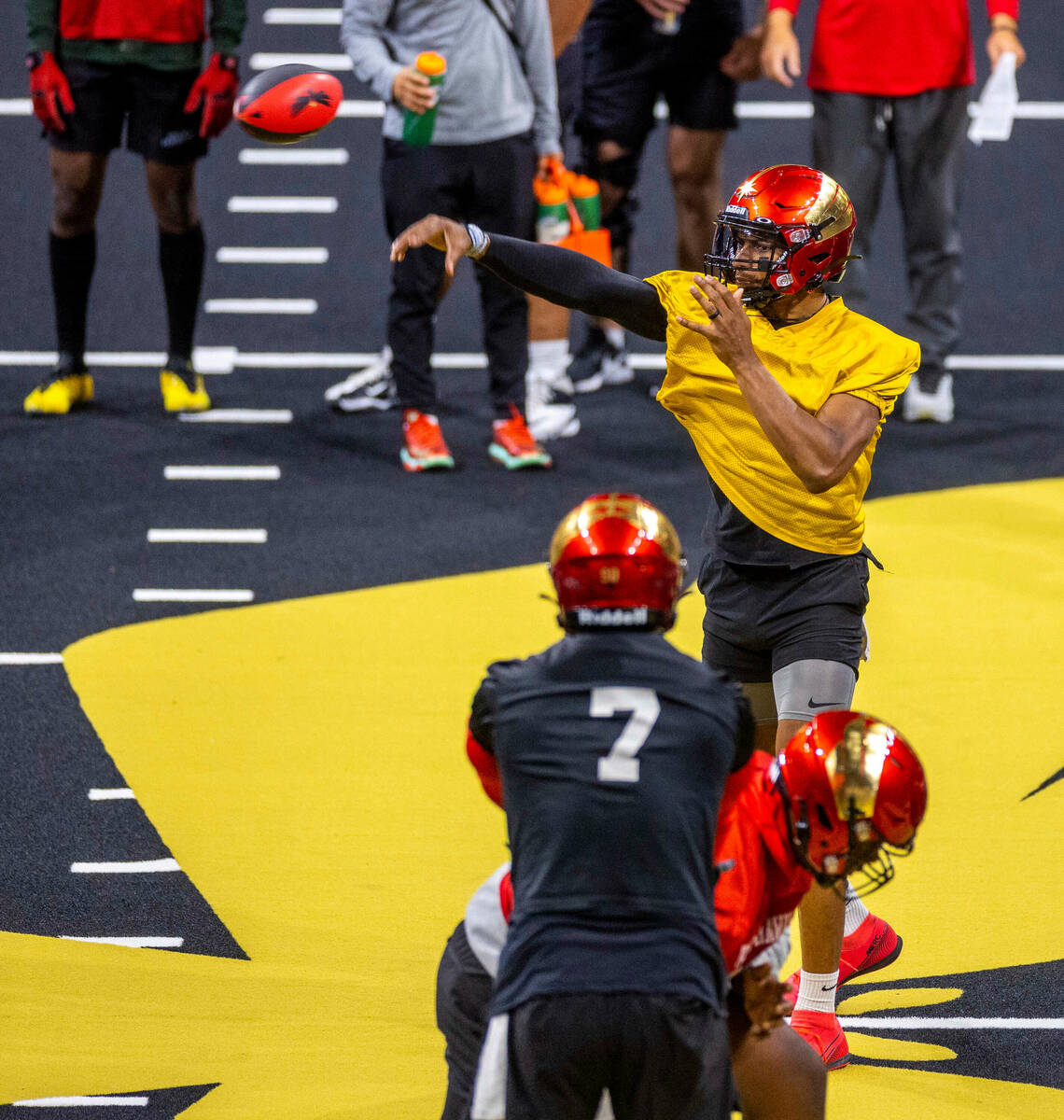 Vegas Knight Hawks quarterback Daquan Neal releases a pass during practice at The Dollar Loan C ...