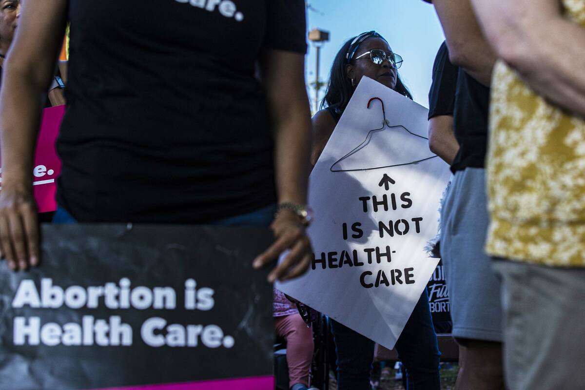 Demonstrators protest during a pro-abortion rally in May 2022 at Sunset Park in Las Vegas. (Ben ...