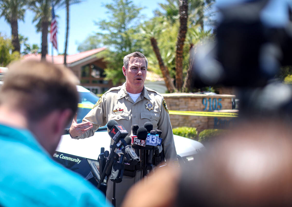 Metro homicide Lt. Jason Johansson addresses the media at the scene of a homicide at an apartme ...