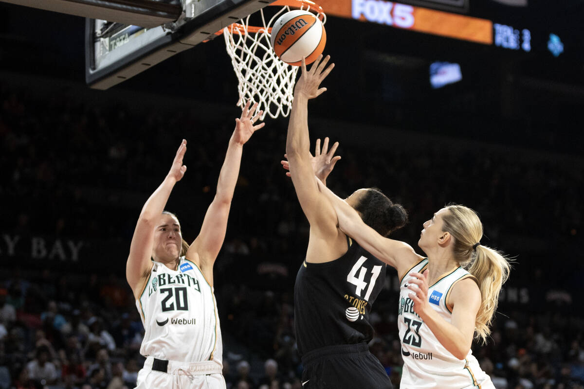 Las Vegas Aces center Kiah Stokes (41) shoots against New York Liberty guard Sabrina Ionescu (2 ...