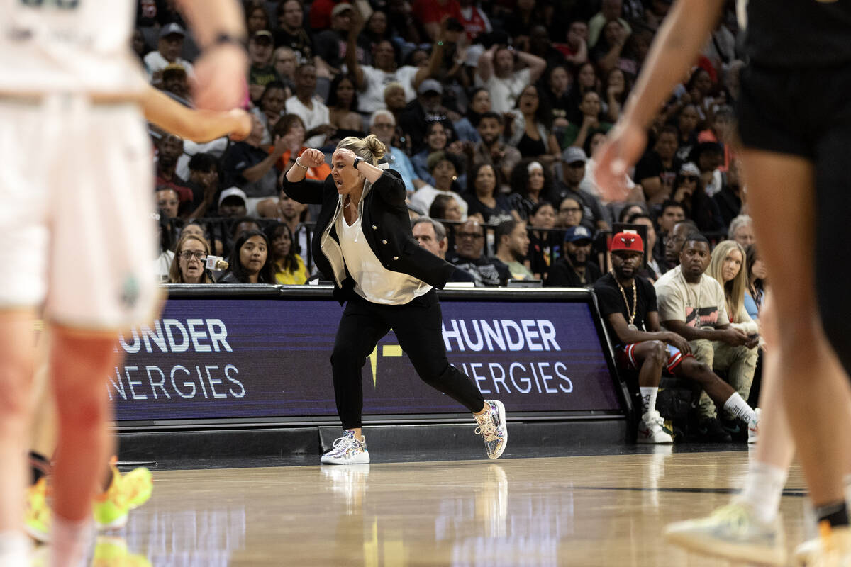 Las Vegas Aces head coach Becky Hammon gets upset with a referee’s foul call on Aces gua ...