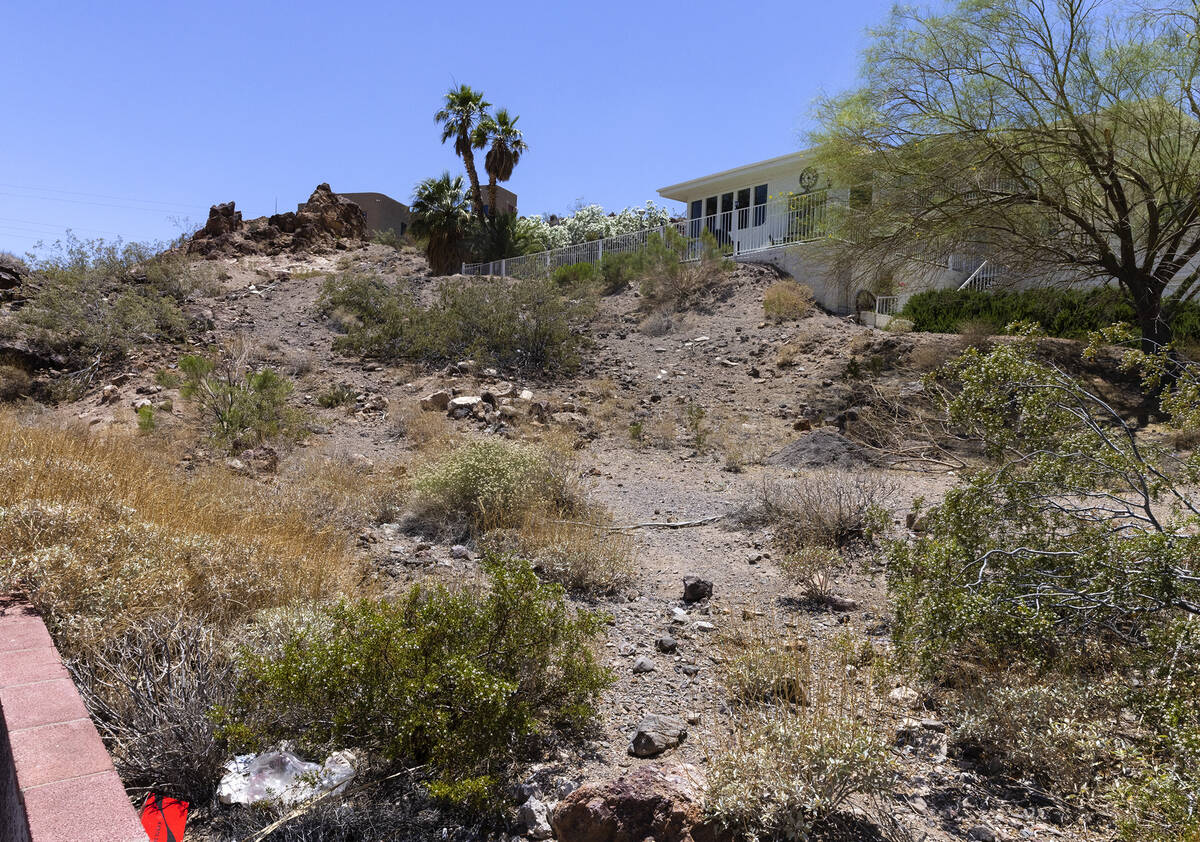 A vacant homesite, center, is seen at the corner of Judi Place and Isabel Drive, on June 2, 202 ...