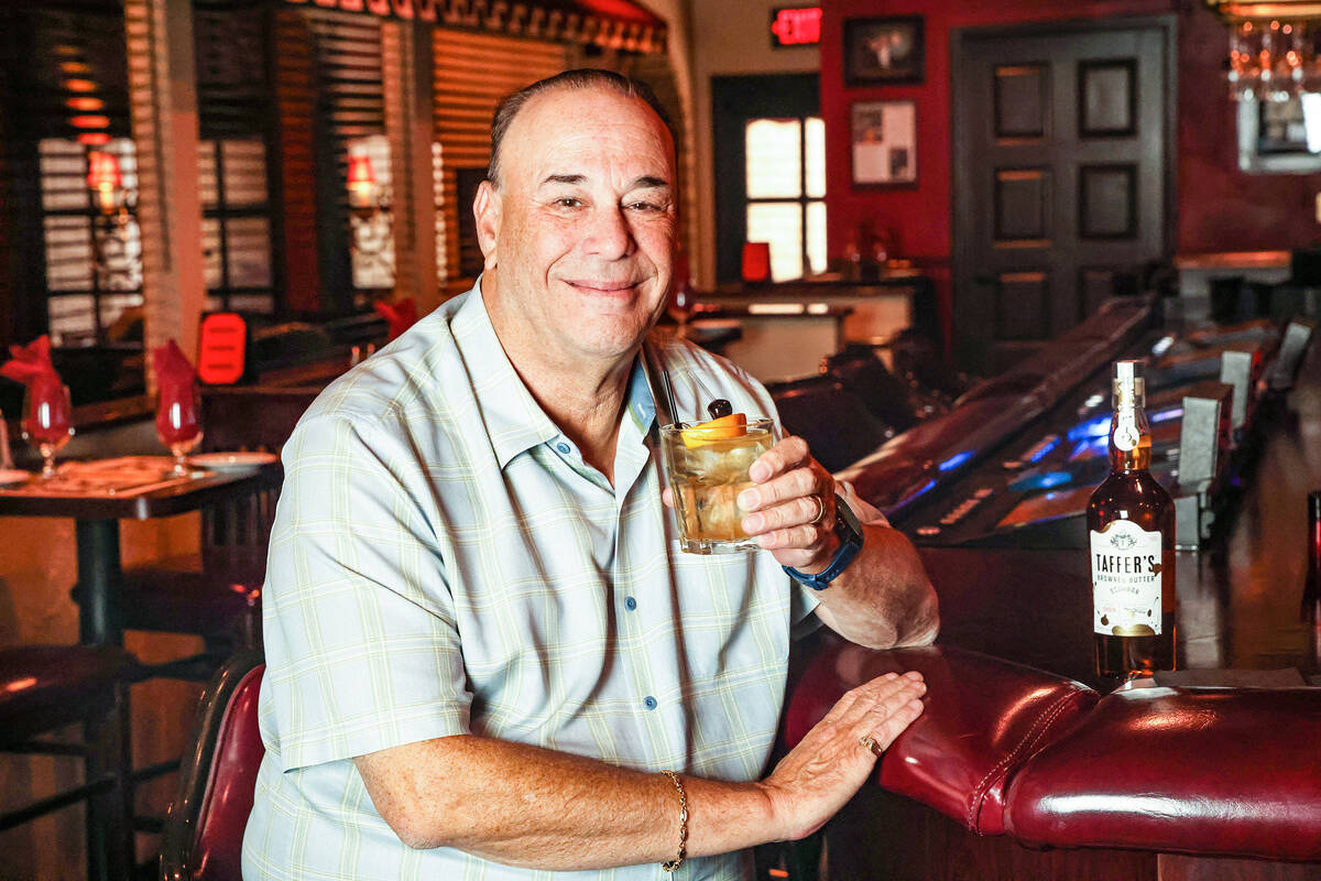 Jon Taffer, the star of the show “Bar Rescue,” holds an old fashioned made with T ...