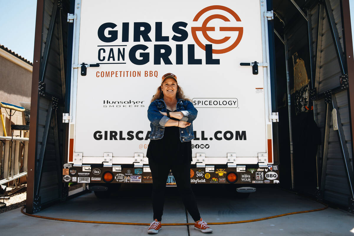 Christie Vanover poses for a portrait in front of her custom Girls Can Grill trailer that she u ...