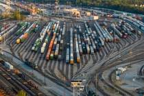 FILE - Freight train cars sit in a Norfolk Southern rail yard on Sept. 14, 2022, in Atlanta. Th ...