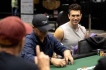 Doug Polk, right, chats with an opponent during the World Series of Poker $10,000 buy-in No-lim ...
