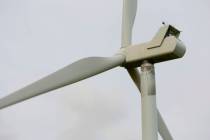 This Monday, June 13, 2022, photo shows a wind turbine at a wind farm along the Montana-Wyoming ...