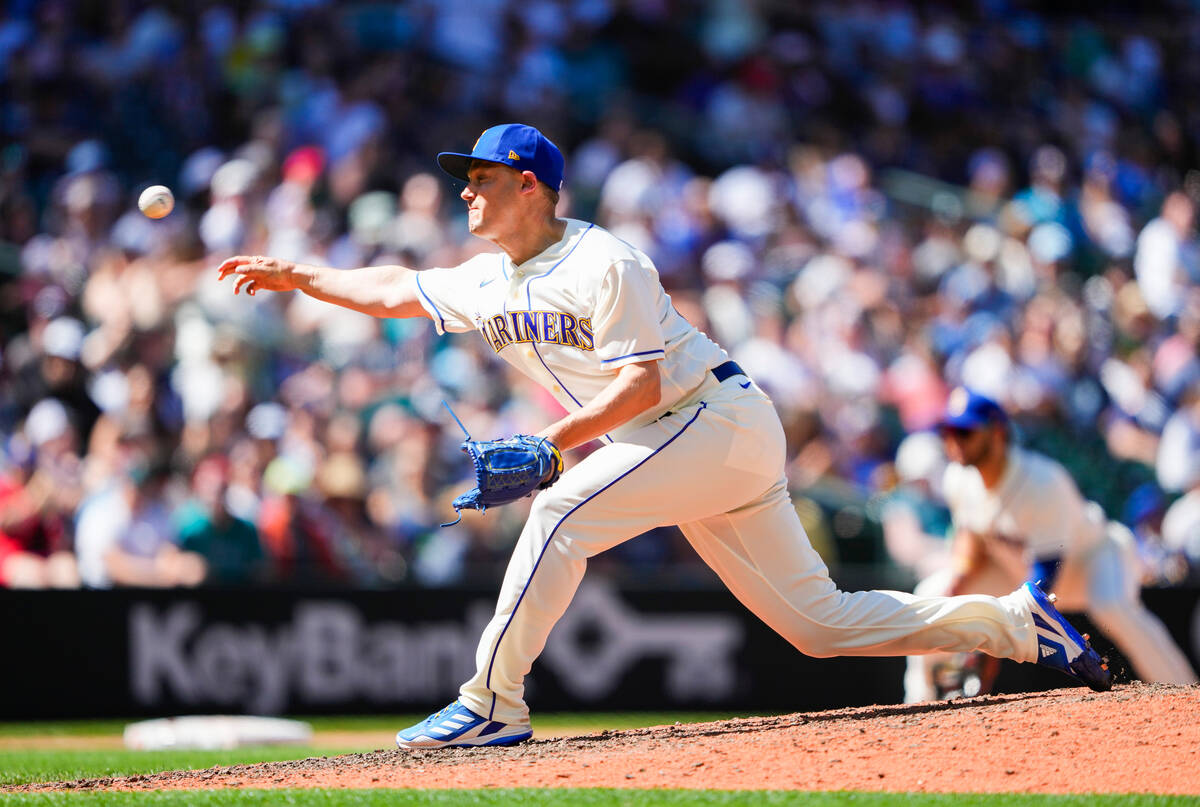 Seattle Mariners relief pitcher Paul Sewald throws against the Tampa Bay Rays during the ninth ...