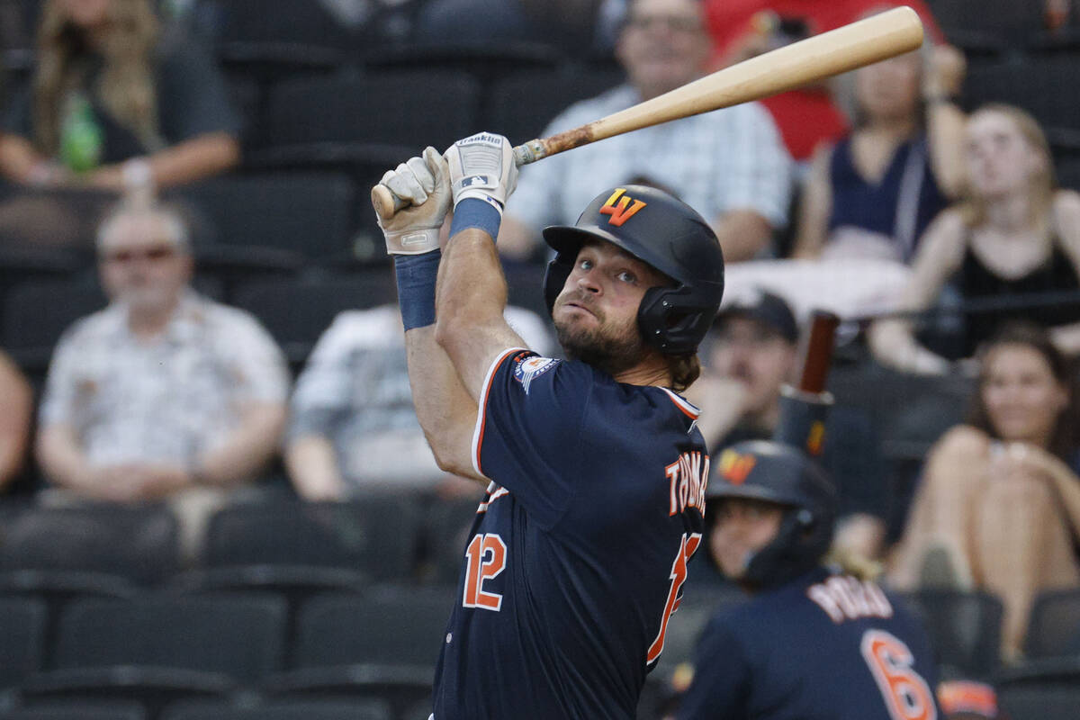 Aviators outfielder Cody Thomas (12) watches his shot agains Round Rock Express during the seco ...