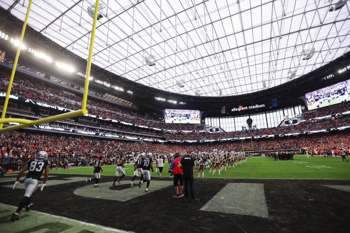 The Las Vegas Raiders take the field for a NFL football game against the Kansas City Chiefs at ...