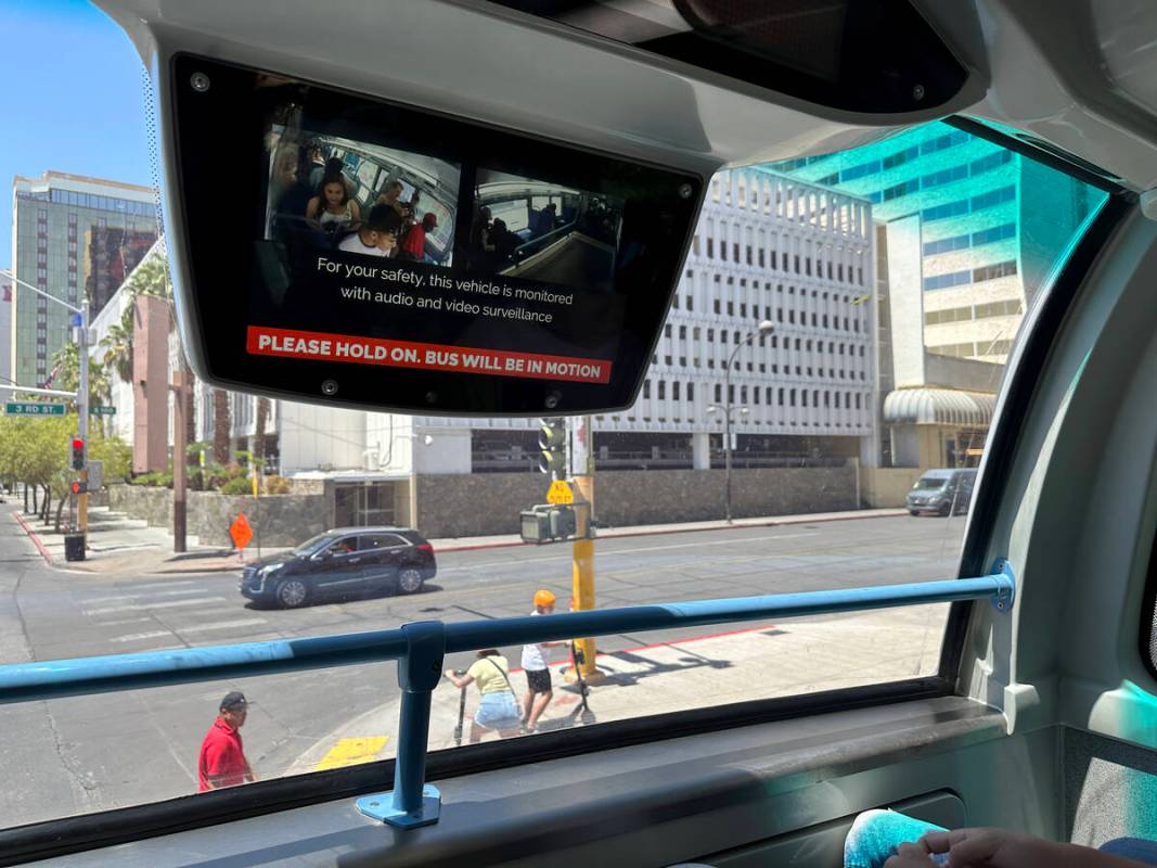 A screen notifies passenger about video surveillance on a Regional Transportation Commission bu ...