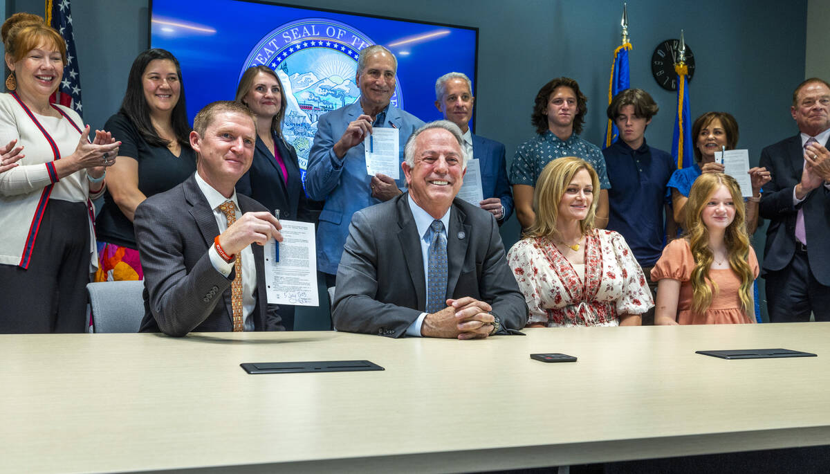 Nevada Gov. Joe Lombardo conducts a ceremonial signing of SB 322 aka Rex's Law about members of ...