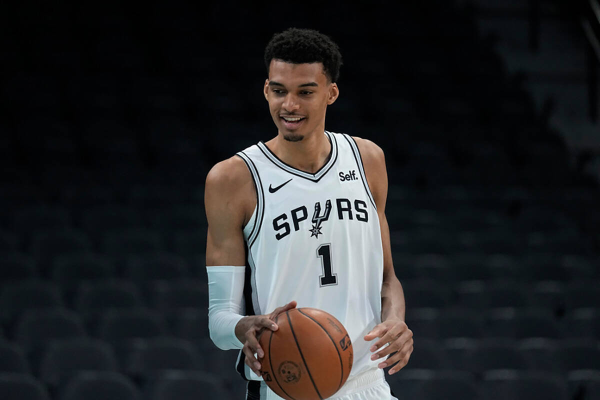 San Antonio Spurs NBA basketball first round draft pick Victor Wembanyama handles the ball foll ...