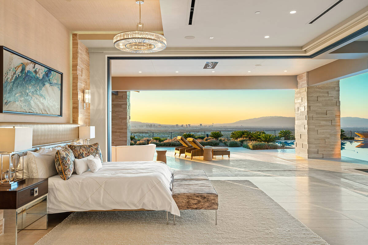 The master suite has disappearing walls that provide views of the Strip and access to the pool. ...