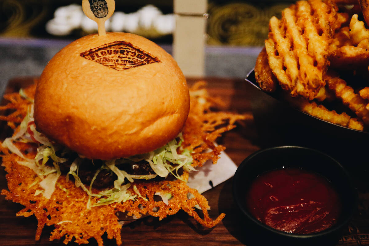 The Crispy Cheese, a staple burger at Guy Fieri’s newest restaurant, is seen on Friday, ...