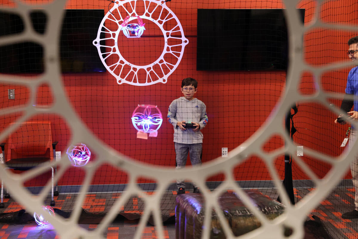 Gaddiel “Prodigy” De La Cruz, 12, plays drone soccer during Drone Soccer Camp at ...