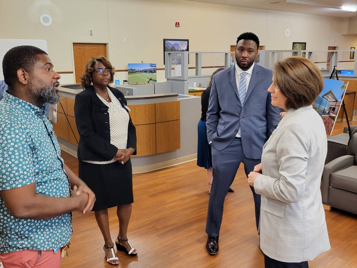 From left, Kenneth Holland, Charlotte Watkins and Lloyd Noble talk to Sen. Catherine Cortez Mas ...
