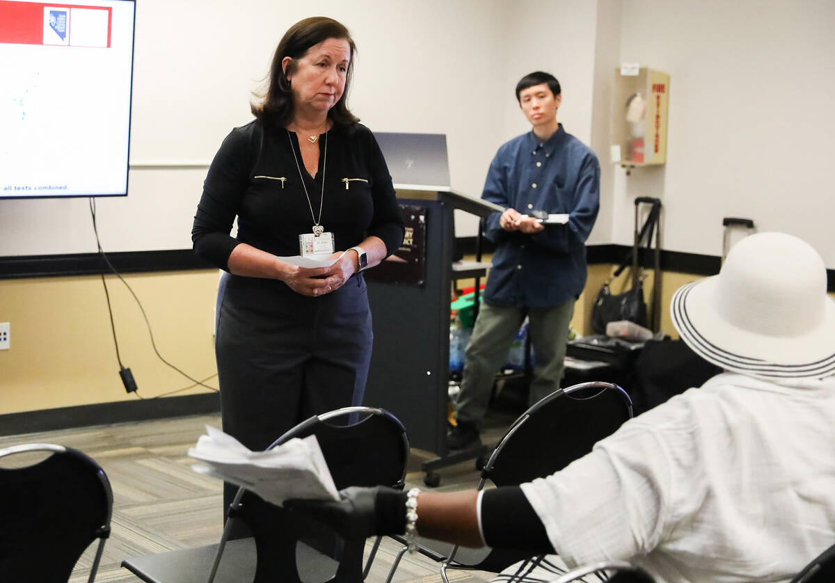 Laura Shaw, principle investigator for Nevada RESEP, listens to Sheron Carter, a longtime resid ...